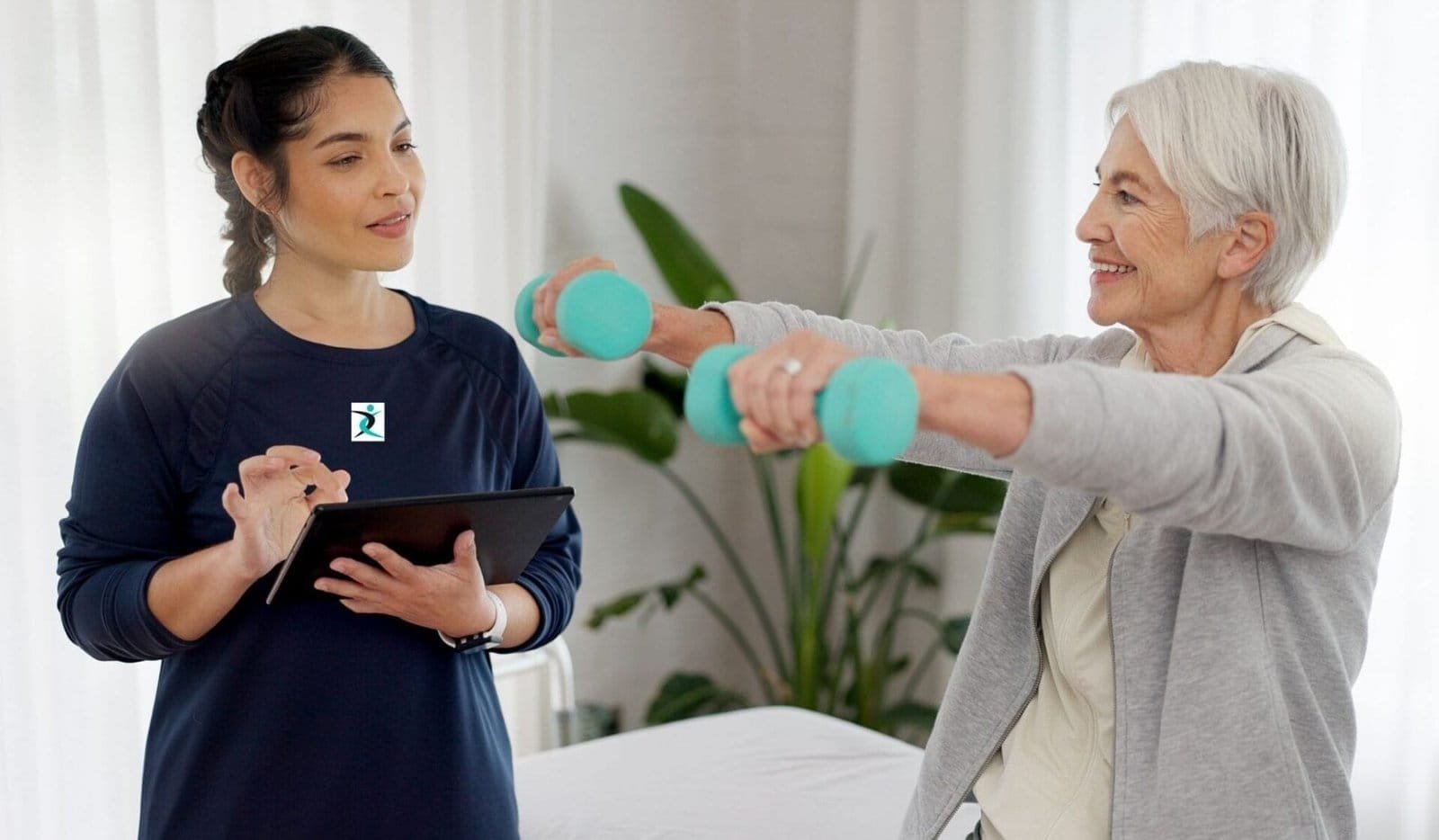 Senior woman lifting dumbbells at home with guidance from a personal trainer in Mississauga