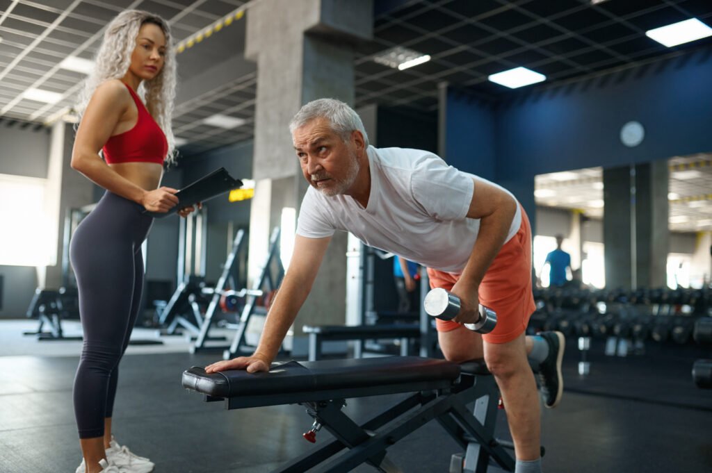 In‑home personal trainer guiding senior client in a North York residence