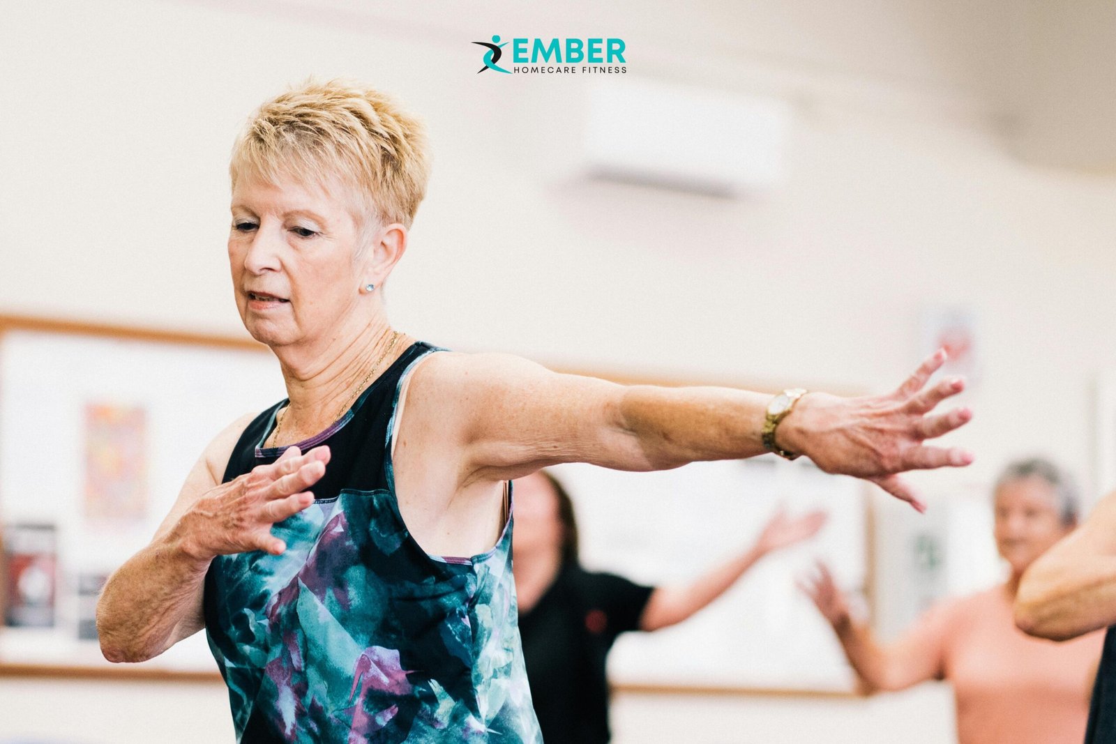 Older woman performing arm extension movement for flexibility and strength
