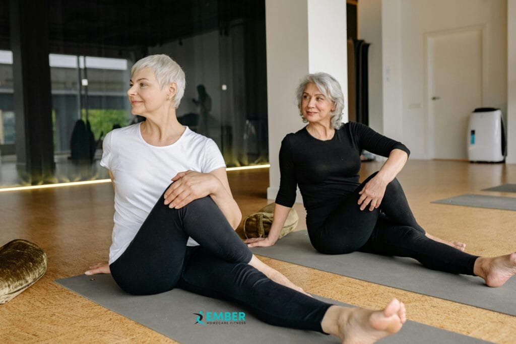 The Ultimate Guide to Senior Fitness 1 personal trainer helping a senior man stretch to improve shoulder posture