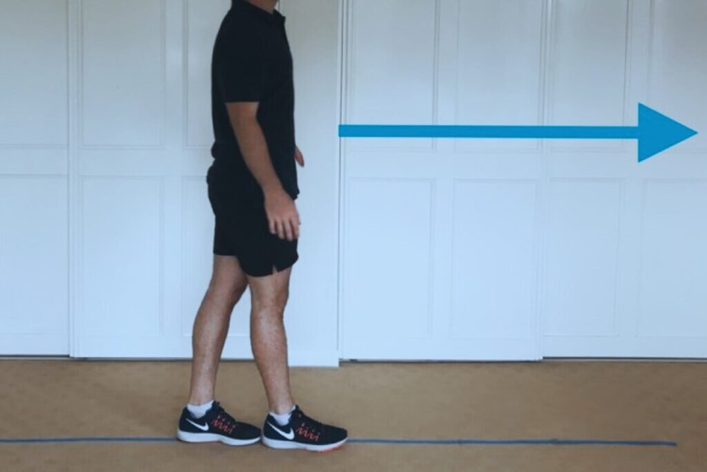 An Oakville senior improving balance with a tandem stance, a crucial exercise for fall prevention and senior fitness in the GTA.