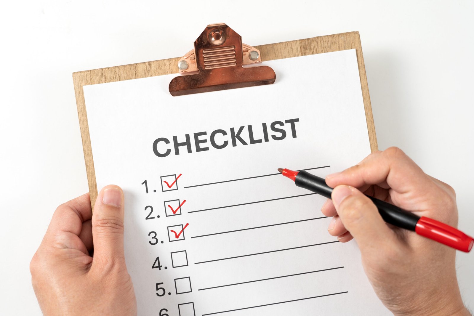 completing checklist with a pen on a clipboard 2026 01 06 10 30 43 utc scaled